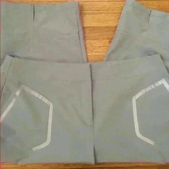 Izod golf capris with reflector pockets - Picture 3 of 7